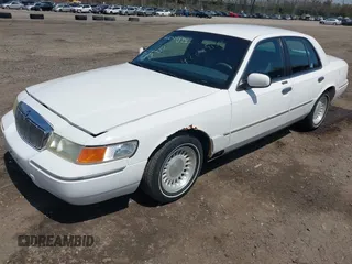 1998 Mercury Grand Marquis LS with VIN 2MEFM75W3WX644251, listed as a IAAI auction lot 42099151 with 195,304 mi miles and . Bid and sale history available at DreamBid. Image 2.