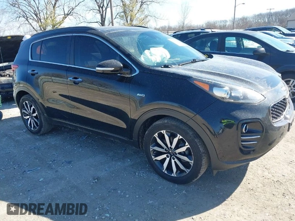 2018 Kia Sportage EX with VIN KNDPNCAC9J7324292, listed as a IAAI auction lot 41859338 with 124,519 mi miles and . Bid and sale history available at carsss.com. Image 1.