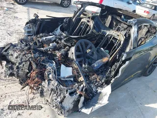 2022 Tesla Model S Plaid z VIN 5YJSA1E64NF477659, wystawiony jako IAAI lot #42358072 z przebiegiem Nie podano mil oraz . Historia ofert i sprzedaży dostępna na DreamBid. Obrazek 6.