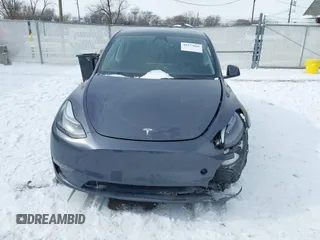 2023 Tesla Model Y Performance with VIN 7SAYGDEF0PF898181, listed as a IAAI auction lot 41577666 with 19,051 mi miles and . Bid and sale history available at DreamBid. Image 12.