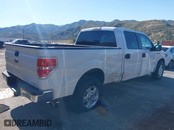 2012 Ford F-150 XL with VIN 1FTFW1CF6CFB74025, listed as a IAAI auction lot 42126700 with 258,539 mi miles. Bid and sale history available at carsss.com. Image 4.