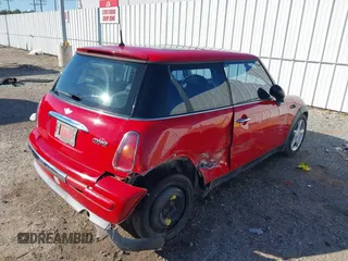 2003 MINI Hardtop with VIN WMWRC33413TC48601, listed as a IAAI auction lot 41418901 with 57,095 mi miles and . Bid and sale history available at DreamBid. Image 4.
