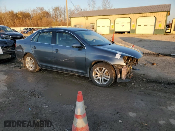 2009 Volkswagen Jetta z VIN 3VWAL71K09M133238, wystawiony jako Copart lot #81069654 z przebiegiem 153 617 mil mil oraz Szkoda całkowita • Salvage title. Historia ofert i sprzedaży dostępna na DreamBid. Obrazek 4.