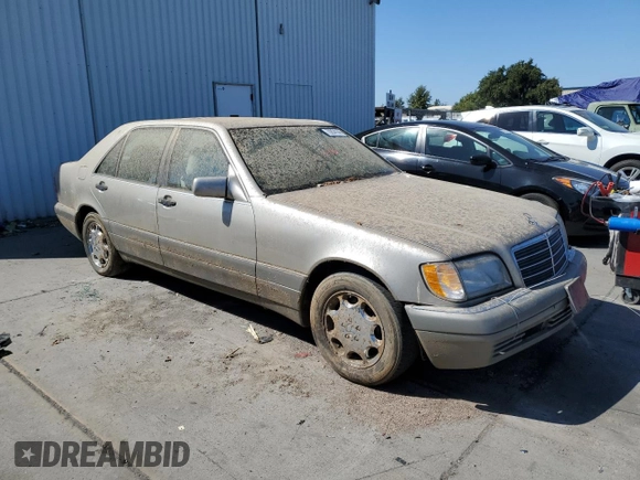 1995 Mercedes-Benz S with VIN WDBGA43E9SA220971, listed as a Copart auction lot 70834144 with Not Provided miles and Clean Title. Bid and sale history available at DreamBid. Image 4.