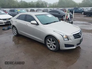 2014 Cadillac ATS Standard AWD z VIN 1G6AG5RX8E0166600, wystawiony jako IAAI lot #42319258 z przebiegiem 102 164 mil mil oraz . Historia ofert i sprzedaży dostępna na DreamBid. Obrazek 1.