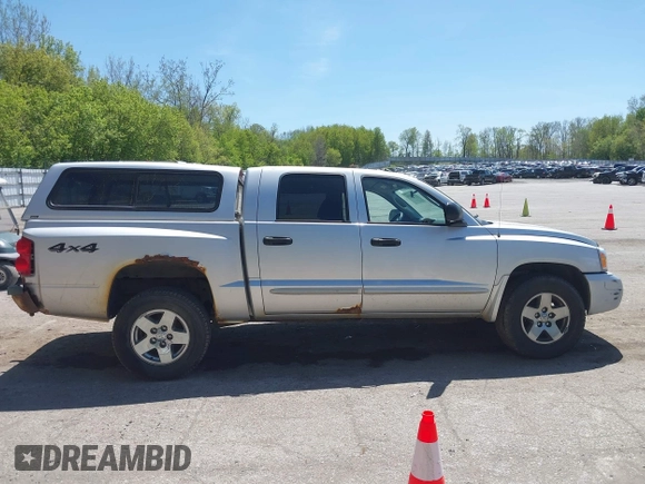 2005 Dodge Dakota SLT with VIN 1D7HW48N45S321002, listed as a IAAI auction lot 42240338 with 214,983 mi miles and . Bid and sale history available at DreamBid. Image 14.
