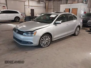 2012 Volkswagen Jetta Sedan SEL w/Sunroof with VIN 3VWLX7AJ4CM344390, listed as a IAAI auction lot 41439880 with 220,093 mi miles. Bid and sale history available at carsss.com. Image 17.