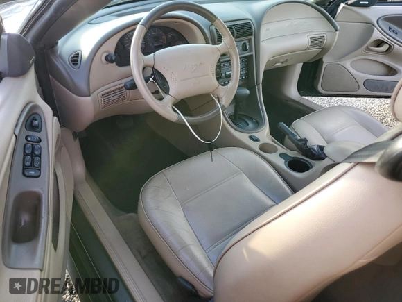 2004 Ford Mustang Deluxe with VIN 1FAFP44414F125267, listed as a Copart auction lot 74595714 with 0 mi miles and Salvage Title. Bid and sale history available at carsss.com. Image 8.
