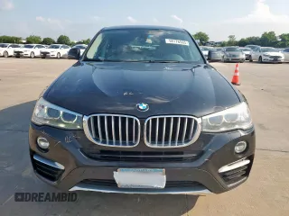 2015 BMW X4 xDrive28i with VIN 5UXXW3C52F0M87621, listed as a Copart auction lot 59176505 with 163,727 mi miles and Salvage title. Bid and sale history available at DreamBid. Image 5.