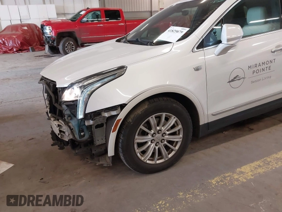 2017 Cadillac XT5 FWD with VIN 1GYKNARS7HZ121596, listed as a IAAI auction lot 41825879 with 82,023 mi miles and . Bid and sale history available at DreamBid. Image 21.