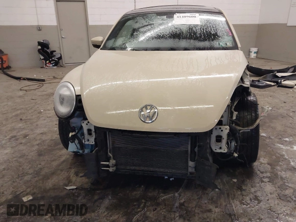 2019 Volkswagen Beetle S with VIN 3VWFD7ATXKM705322, listed as a IAAI auction lot 41409600 with 97,479 mi miles. Bid and sale history available at carsss.com. Image 6.