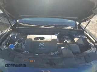 2023 Mazda CX-50 S Premium Plus with VIN 7MMVABEM8PN129773, listed as a Copart auction lot 82489824 with 31,567 mi miles and Salvage Title. Bid and sale history available at DreamBid. Image 12.