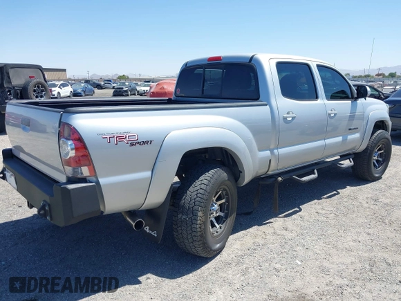 2013 Toyota Tacoma with VIN 3TMMU4FN2DM055326, listed as a IAAI auction lot 42560152 with 198,406 mi miles and . Bid and sale history available at DreamBid. Image 4.
