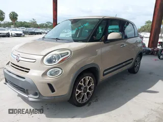 2014 FIAT 500L Trekking with VIN ZFBCFADH2EZ018037, listed as a IAAI auction lot 42196695 with 88,743 mi miles and . Bid and sale history available at DreamBid. Image 2.