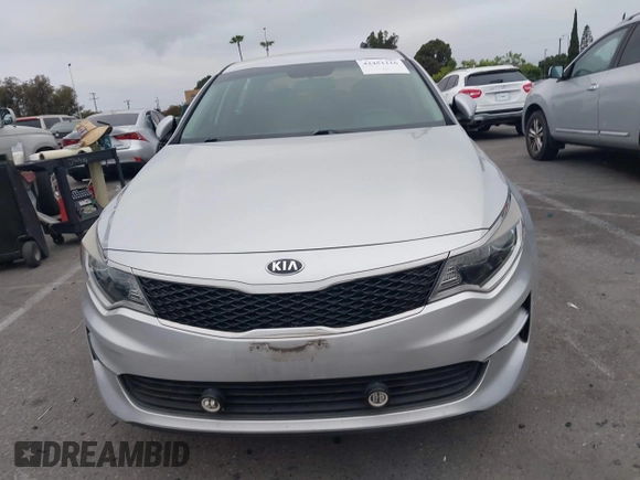 2018 Kia Optima S with VIN 5XXGT4L35JG216039, listed as a IAAI auction lot 42451216 with 91,679 mi miles and . Bid and sale history available at DreamBid. Image 12.