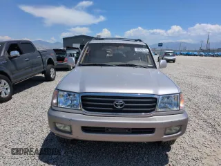 2000 Toyota Land Cruiser z VIN JT3HT05J5Y0118136, wystawiony jako Copart lot #60333115 z przebiegiem 184 284 mil mil oraz Czysty tytuł • Clean title. Historia ofert i sprzedaży dostępna na DreamBid. Obrazek 5.