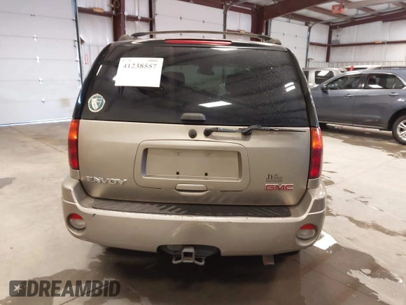 2003 GMC Envoy SLT z VIN 1GKDS13S932299354, wystawiony jako IAAI lot #41238557 z przebiegiem 251 535 mil mil oraz . Historia ofert i sprzedaży dostępna na DreamBid. Obrazek 17.