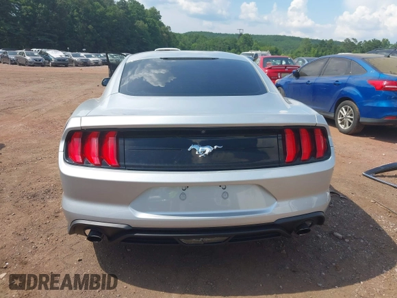 2018 Ford Mustang EcoBoost z VIN 1FA6P8TH6J5174509, wystawiony jako IAAI lot #42627744 z przebiegiem 83 093 mil mil oraz . Historia ofert i sprzedaży dostępna na DreamBid. Obrazek 16.