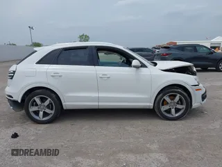 2015 Audi Q3 Premium Plus z VIN WA1EFCFS7FR006939, wystawiony jako IAAI lot #42067797 z przebiegiem 97 663 mil mil oraz . Historia ofert i sprzedaży dostępna na DreamBid. Obrazek 13.