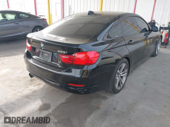 2015 BMW 4 Series 428i with VIN WBA4A9C52FGL85228, listed as a IAAI auction lot 41228043 with 152,729 mi miles and . Bid and sale history available at DreamBid. Image 4.