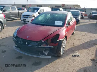2018 Tesla Model 3 Long Range Battery with VIN 5YJ3E1EA8JF047298, listed as a IAAI auction lot 41403507 with 172,142 mi miles and . Bid and sale history available at DreamBid. Image 2.
