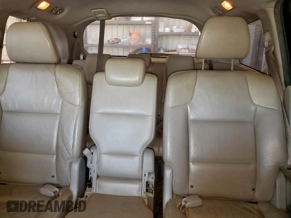 2012 Honda Odyssey Touring с VIN 5FNRL5H94CB049626, выставлен на аукционе Copart как лот 61191435 с пробегом 199 728 миль миль и Списание • Salvage title. История ставок и продаж доступна на DreamBid. Изображение 10.