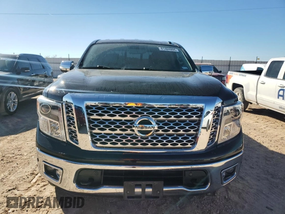 2017 Nissan Titan SL z VIN 1N6AA1E54HN554049, wystawiony jako Copart lot #81404094 z przebiegiem 97 811 mil mil oraz Czysty tytuł • Clean title. Historia ofert i sprzedaży dostępna na DreamBid. Obrazek 5.