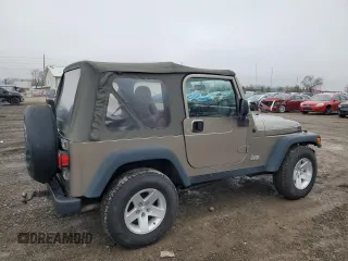 2004 Jeep Wrangler Rubicon with VIN 1J4FA69S24P743345, listed as a Copart auction lot 87067154 with 153,783 mi miles and Salvage Title. Bid and sale history available at carsss.com. Image 3.