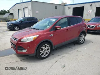 2013 Ford Escape SEL with VIN 1FMCU0HX7DUA95427, listed as a Copart auction lot 61261045 with 75,276 mi miles and Salvage title. Bid and sale history available at DreamBid. Image 1.