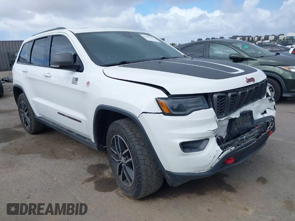 2018 Jeep Grand Cherokee Trailhawk with VIN 1C4RJFLT2JC137793, listed as a IAAI auction lot 41697299 with 149,100 mi miles and . Bid and sale history available at DreamBid. Image 1.