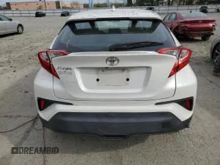 2019 Toyota C-HR XLE z VIN NMTKHMBX7KR073500, wystawiony jako Copart lot #53596395 z przebiegiem 91 934 mil mil oraz Szkoda całkowita • Salvage title. Historia ofert i sprzedaży dostępna na DreamBid. Obrazek 6.