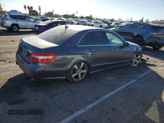 2011 Mercedes-Benz E 550 Luxury with VIN WDDHF7CBXBA307881, listed as a Copart auction lot 84961394 with 192,563 mi miles and Salvage Title. Bid and sale history available at DreamBid. Image 3.