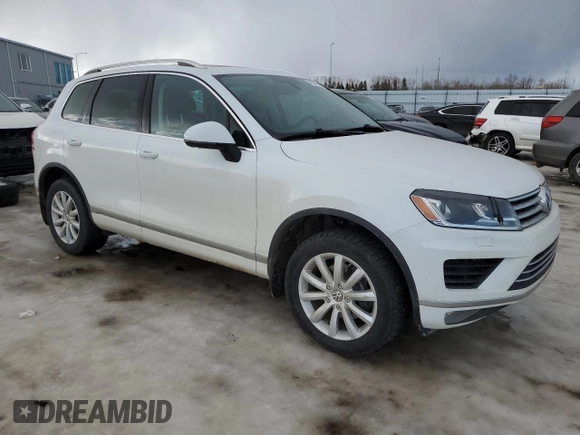 2017 Volkswagen Touareg Sport with VIN WVGEF7BP3HD002560, listed as a Copart auction lot 46649865 with 115,704 mi miles and Salvage Title. Bid and sale history available at DreamBid. Image 4.