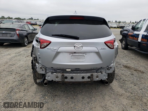 2016 Mazda CX-5 Touring with VIN JM3KE4CY6G0655381, listed as a Copart auction lot 53311445 with 145,513 mi miles and Salvage Title. Bid and sale history available at carsss.com. Image 6.