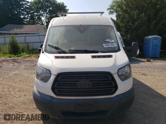 2016 Ford Transit Cargo z VIN 1FTYR2CG3GKB38143, wystawiony jako Copart lot #60861365 z przebiegiem 67 107 mil mil oraz Czysty tytuł • Clean title. Historia ofert i sprzedaży dostępna na DreamBid. Obrazek 5.