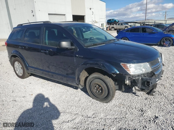 2015 Dodge Journey American Value Pkg with VIN 3C4PDCAB3FT737029, listed as a Copart auction lot 80396454 with 133,169 mi miles and Salvage Title. Bid and sale history available at carsss.com. Image 4.