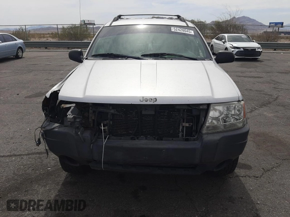 2004 Jeep Grand Cherokee Laredo with VIN 1J4GW48S34C339876, listed as a Copart auction lot 52428045 with 229,606 mi miles and Salvage Title. Bid and sale history available at carsss.com. Image 5.