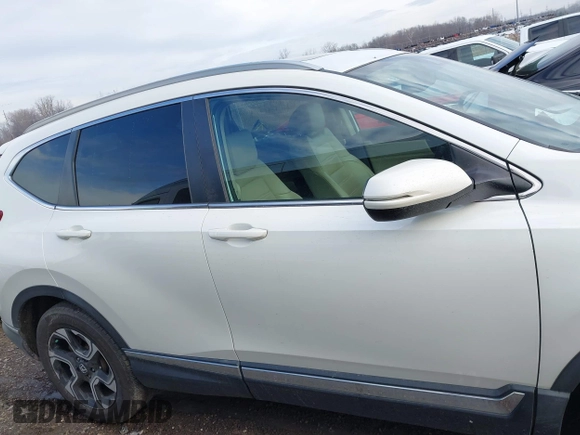 2017 Honda CR-V Touring with VIN 5J6RW2H92HL040217, listed as a IAAI auction lot 41044193 with 180,842 mi miles. Bid and sale history available at carsss.com. Image 13.
