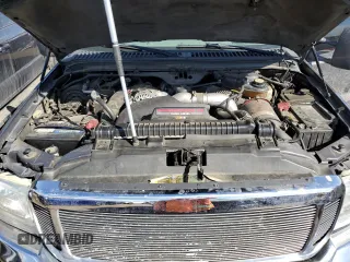 2003 Ford F-250 XL z VIN 1FTNX21PX3EB94715, wystawiony jako Copart lot #50712735 z przebiegiem 96 293 mil mil oraz Szkoda całkowita • Salvage title. Historia ofert i sprzedaży dostępna na DreamBid. Obrazek 11.