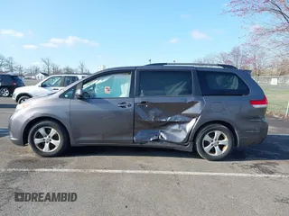 2014 Toyota Sienna LE AAS with VIN 5TDKK3DC5ES483532, listed as a IAAI auction lot 41905911 with 122,392 mi miles and . Bid and sale history available at DreamBid. Image 14.