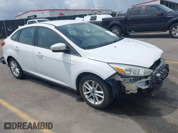 2015 Ford Focus SE with VIN 1FADP3F28FL204145, listed as a IAAI auction lot 42107720 with 129,441 mi miles and . Bid and sale history available at DreamBid. Image 1.