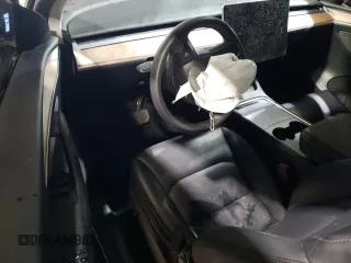 2023 Tesla Model Y Long Range z VIN 7SAYGAEE3PF968231, wystawiony jako Copart lot #45811385 z przebiegiem Nie podano mil oraz Szkoda całkowita • Salvage title. Historia ofert i sprzedaży dostępna na DreamBid. Obrazek 8.