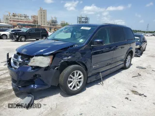 2014 Dodge Grand Caravan SXT z VIN 2C4RDGCG7ER187490, wystawiony jako Copart lot #56684445 z przebiegiem 104 729 mil mil oraz Szkoda całkowita • Salvage title. Historia ofert i sprzedaży dostępna na DreamBid. Obrazek 1.