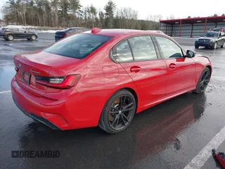 2022 BMW 3 Series M340i xDrive with VIN WBA5U9C01NFM09684, listed as a IAAI auction lot 41670169 with 38,640 mi miles and . Bid and sale history available at DreamBid. Image 4.