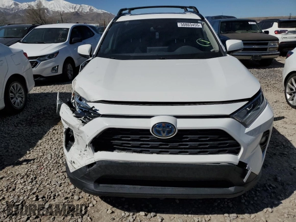 2021 Toyota RAV4 Hybrid XLE with VIN JTMRWRFV6MD559354, listed as a Copart auction lot 50803455 with 56,604 mi miles and Salvage Title. Bid and sale history available at carsss.com. Image 5.