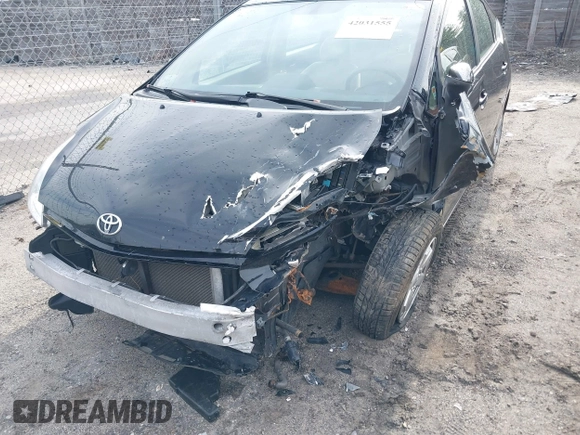 2005 Toyota Prius with VIN JTDKB22U353060181, listed as a IAAI auction lot 42031555 with 165,015 mi miles. Bid and sale history available at carsss.com. Image 6.