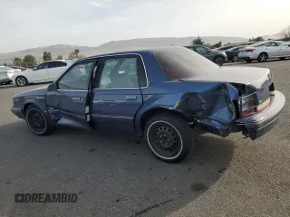 1994 Oldsmobile Cutlass Ciera S z VIN 1G3AG55M3R6436697, wystawiony jako Copart lot #79562944 z przebiegiem 118 629 mil mil oraz Szkody całkowita. Historia ofert i sprzedaży dostępna na DreamBid. Obrazek 2.