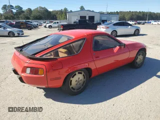 1982 Porsche 928 z VIN WP0JA0927CS822406, wystawiony jako Copart lot #80980144 z przebiegiem 86 048 mil mil oraz Szkody całkowita. Historia ofert i sprzedaży dostępna na DreamBid. Obrazek 3.