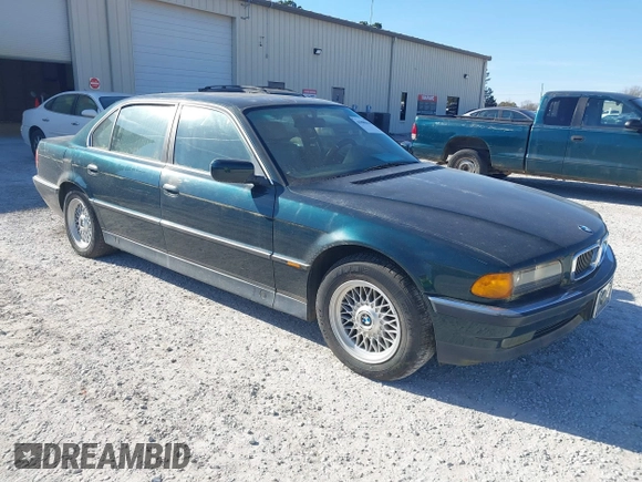 1998 BMW 7 Series 740il with VIN WBAGJ8323WDM13455, listed as a IAAI auction lot 41888636 with 1 mi miles. Bid and sale history available at carsss.com. Image 1.