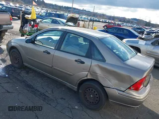 2004 Ford Focus SE with VIN 1FAFP34354W167961, listed as a IAAI auction lot 41545304 with 128,560 mi miles and . Bid and sale history available at DreamBid. Image 3.